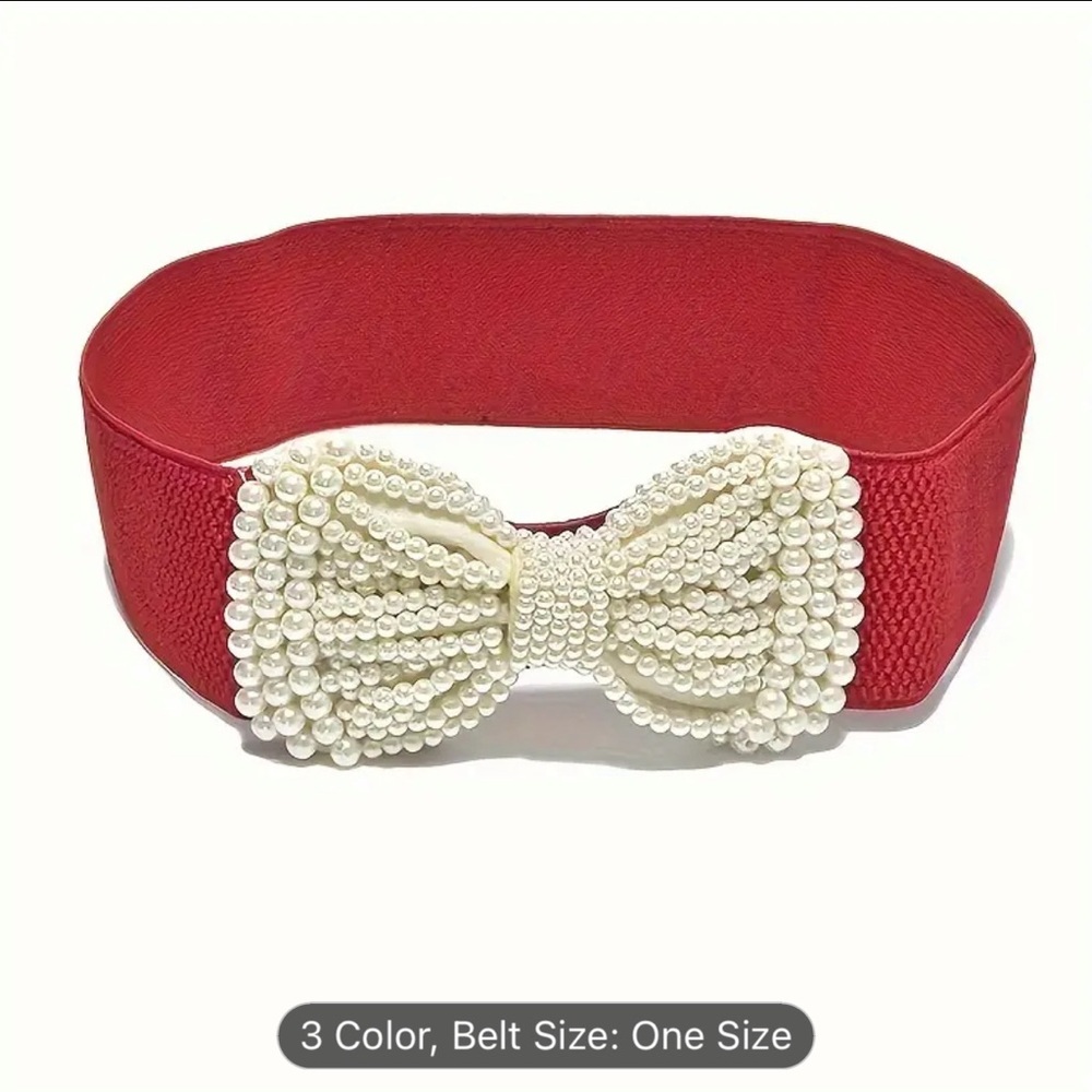 An elegant solid colored elastic waistband with a wide imitation pearl bow